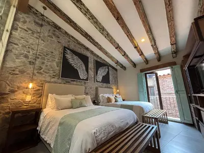 Cama o camas de una habitación en Castello di Carlo - Departamento Carlo Magno III