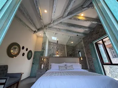 Cama o camas de una habitación en Castello di Carlo - Departamento Carlo Magno III