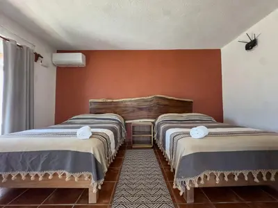 Cama o camas de una habitación en Casa Godmar with Starlink