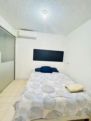 Cama o camas de una habitación en Casa cálida Mag-Ho, con servicios incluidos