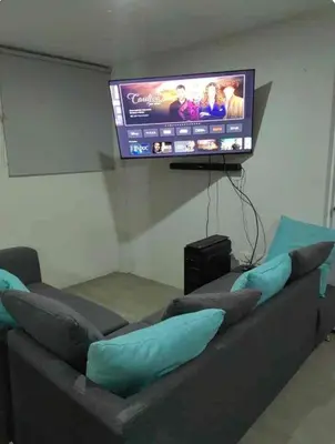 Una televisión o centro de entretenimiento en Departamento Atlixco