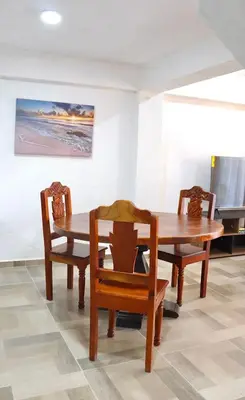 Una televisión o centro de entretenimiento en Departamento céntrico Huatulco