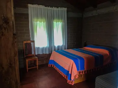 Cama o camas de una habitación en LomaRaboRatón