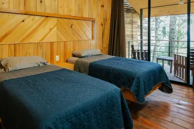 Cama o camas de una habitación en Rocabosque oaxaca