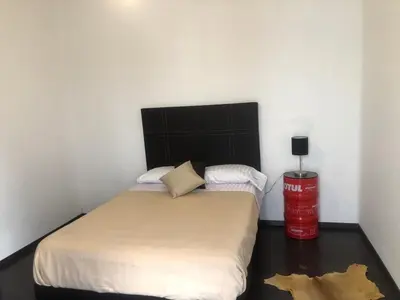 Cama o camas de una habitación en Centro Histórico Inolvidable Puebla