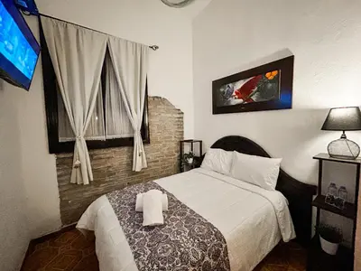 Cama o camas de una habitación en Casona Albarelo