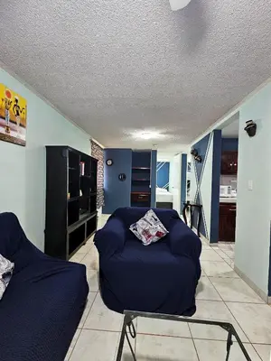 Zona de estar de Sensity home C Escolar Departamento hogareño y Calido para familias