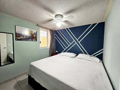 Cama o camas de una habitación en Sensity home C Escolar Departamento hogareño y Calido para familias