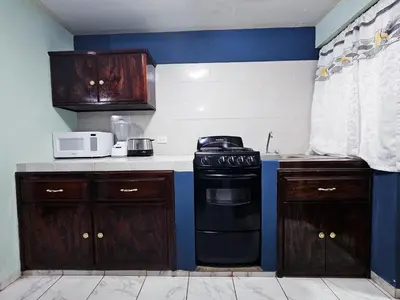 Una cocina o zona de cocina en Sensity home C Escolar Departamento hogareño y Calido para familias