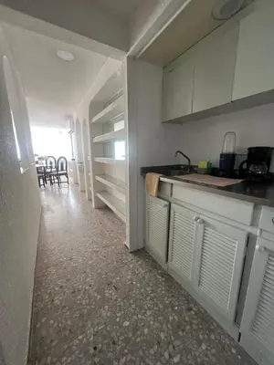 Una cocina o zona de cocina en Suite con acceso a playa y vista espectacular