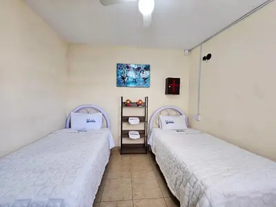 Cama o camas de una habitación en Sensity home Departamento 2 Hogareño y confortable