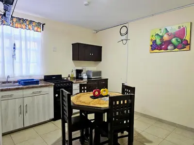 Una cocina o zona de cocina en Sensity home Departamento 2 Hogareño y confortable