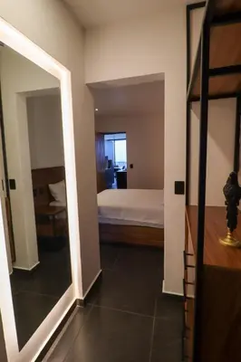 Cama o camas de una habitación en Palmas Luxury Apartment 106