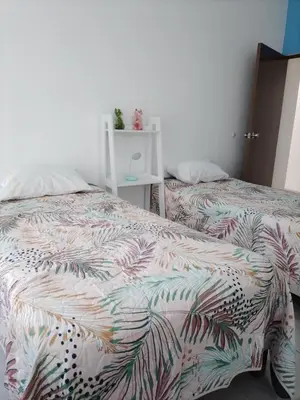 Cama o camas de una habitación en El Rinconcito de Xalapa