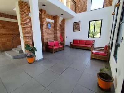 Zona de estar de Casa de campo con alberca