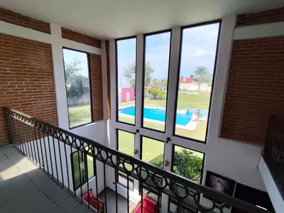 Piscina en o cerca de Casa de campo con alberca