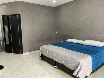 Cama o camas de una habitación en Hotel Arcangeles