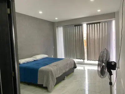 Cama o camas de una habitación en Hotel Arcangeles