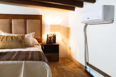 Cama o camas de una habitación en Casa Xolotl, un lugar ancestral