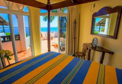 Cama o camas de una habitación en Casa de La Paz - Beautiful Beachfront Villa