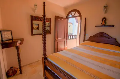 Cama o camas de una habitación en Casa de La Paz - Beautiful Beachfront Villa