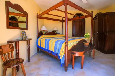 Cama o camas de una habitación en Casa de La Paz - Beautiful Beachfront Villa