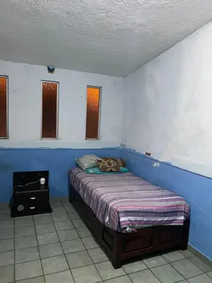 Cama o camas de una habitación en Casa AXL