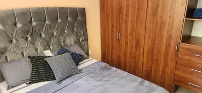 Cama o camas de una habitación en Casa amplia cerca del centro