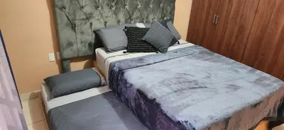 Cama o camas de una habitación en Casa amplia cerca del centro