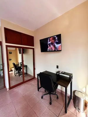 Una televisión o centro de entretenimiento en Departamento Fila