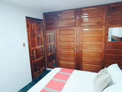 Cama o camas de una habitación en Hogar Díaz, Tradición y Confort en el Centro, 2BR