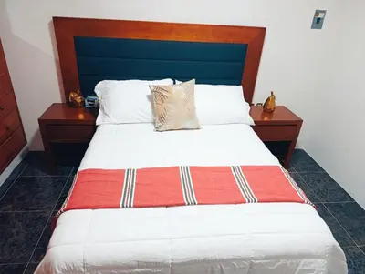 Cama o camas de una habitación en Hogar Díaz, Tradición y Confort en el Centro, 2BR