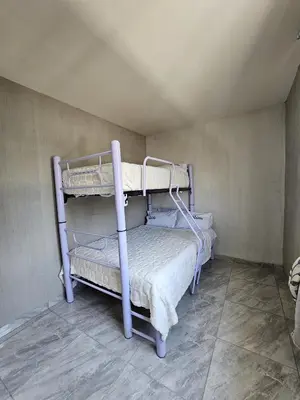 Cama o camas de una habitación en El Riego Casa amplia, moderna y luminosa