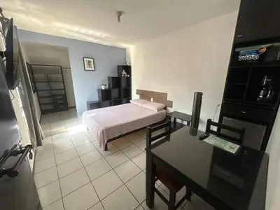 Una televisión o centro de entretenimiento en Don Tuga