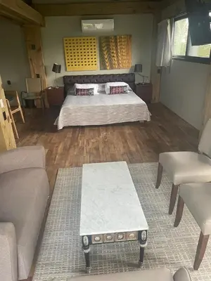 Cama o camas de una habitación en Suites Puerto Escondido KINEKI