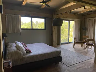 Cama o camas de una habitación en Suites Puerto Escondido KINEKI