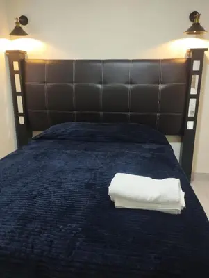Cama o camas de una habitación en Hermosa casita en el centro de Tlatlauquitepec Pueblo Magico