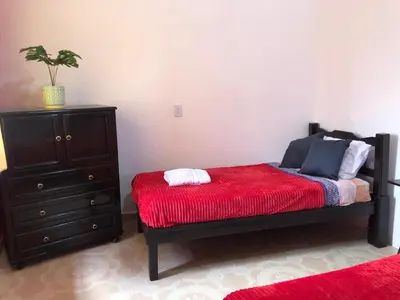 Cama o camas de una habitación en Posada Puesta del Sol