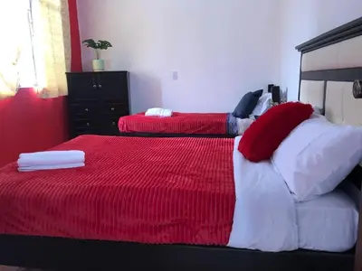 Cama o camas de una habitación en Posda Puesta del Sol