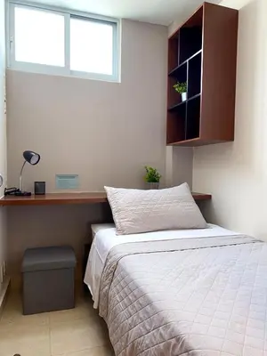 Cama o camas de una habitación en Departamento Mayan Lakes T6 - Albercas, club de playa, tenis, pádel y más
