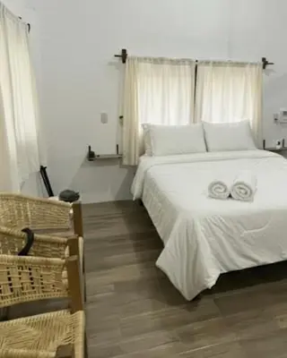 Cama o camas de una habitación en Casa 