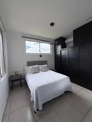 Cama o camas de una habitación en Departamento Tortugas