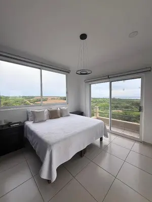 Cama o camas de una habitación en Departamento Tortugas