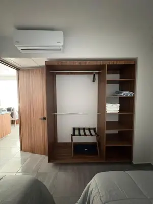Cama o camas de una habitación en Frente a la Playa con acceso directo AC Alberca y Elevador