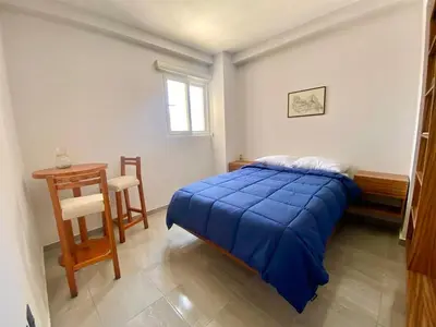 Cama o camas de una habitación en Frente a la Playa con acceso directo AC Alberca y Elevador