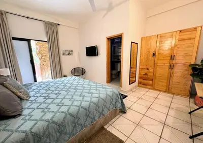 Cama o camas de una habitación en Sunset Suites