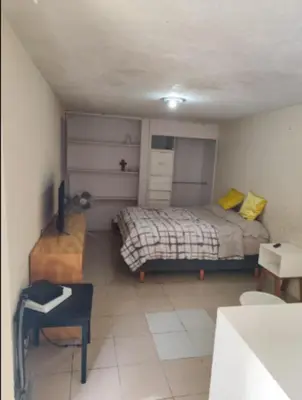 Cama o camas de una habitación en Jayau Apartamentos Coyoacan