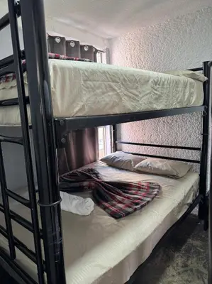 Cama o camas de una habitación en Depa Tláhuac