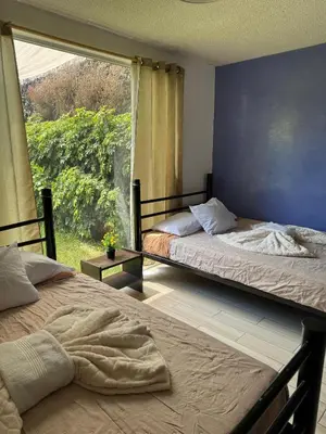 Cama o camas de una habitación en Casa Xochimilco