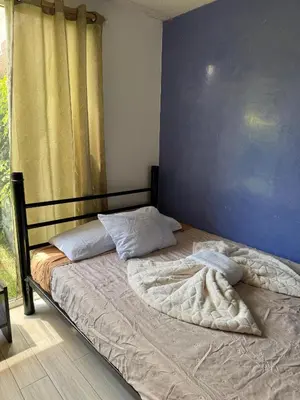 Cama o camas de una habitación en Casa Xochimilco